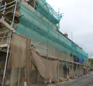 lime rendering on a listed building in somerset (before) 