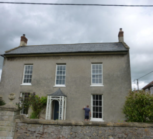 lime rendering on a listed building in somerset (before) 